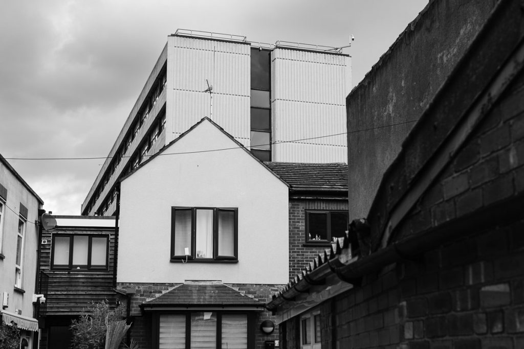 Black & White showing angled roofs of 1970's to modern buildings.