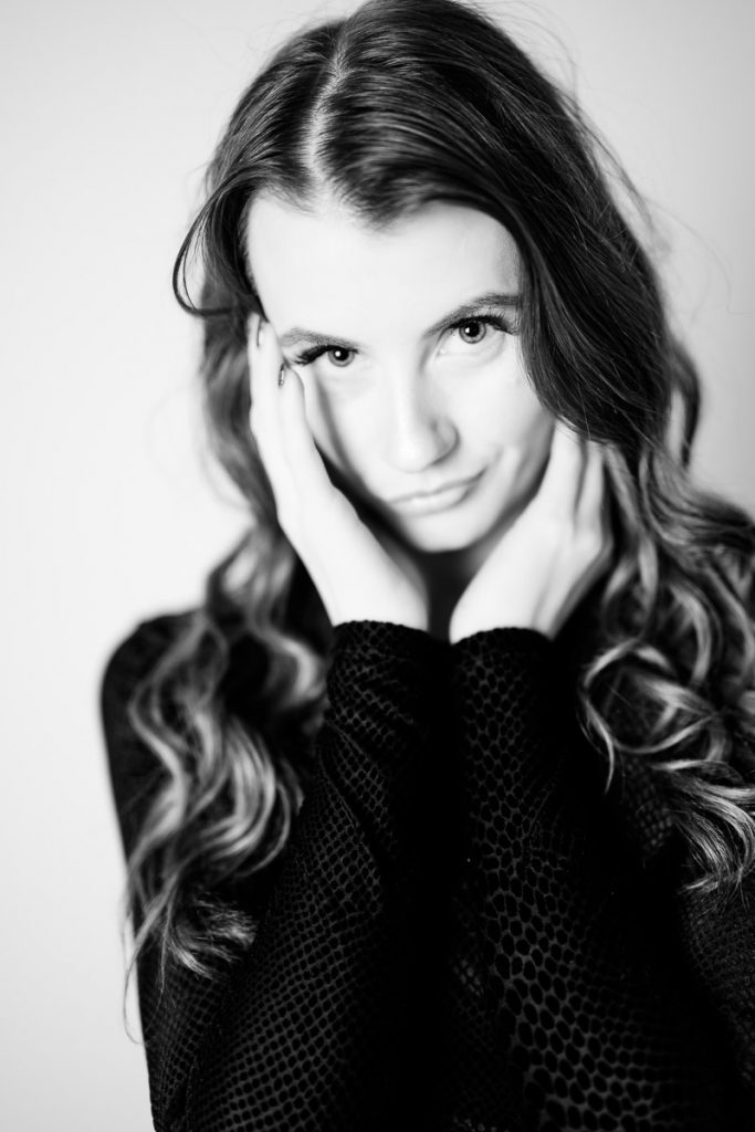 Portrait of model Brook Lee, close up head shot, taken wide open so only the eyes are in focus.