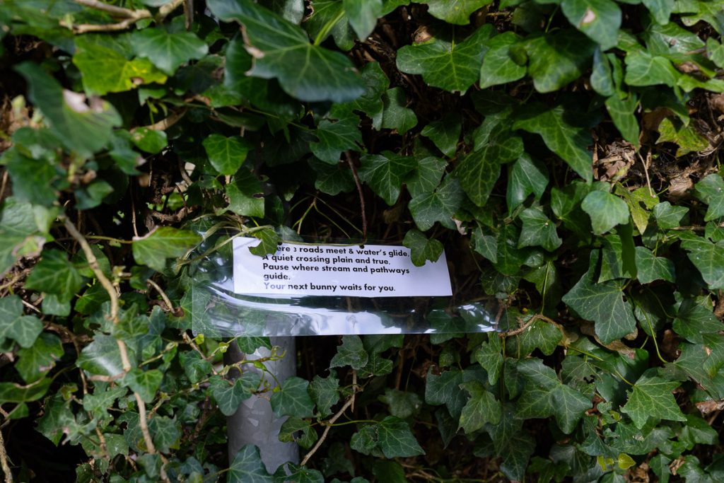 Where three roads meet & waters glide.  A quiet crossing plain and true.  Pause where streams and pathways guide. Your next bunny waits for you.