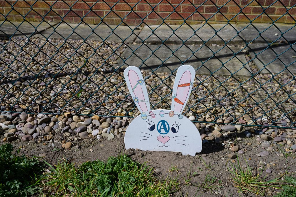 Another cardboard white rabbit near the tennis courts.